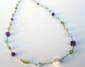 Purple amethyst, green peridot, blue apatite pearl necklace on silk with sterling silver