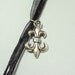 Gothic Lolita Necklace with Czech Crystals, Zombie Girl, Fleur de Lis and Lock Charms - On A Quadruple Strand Black Ribbon