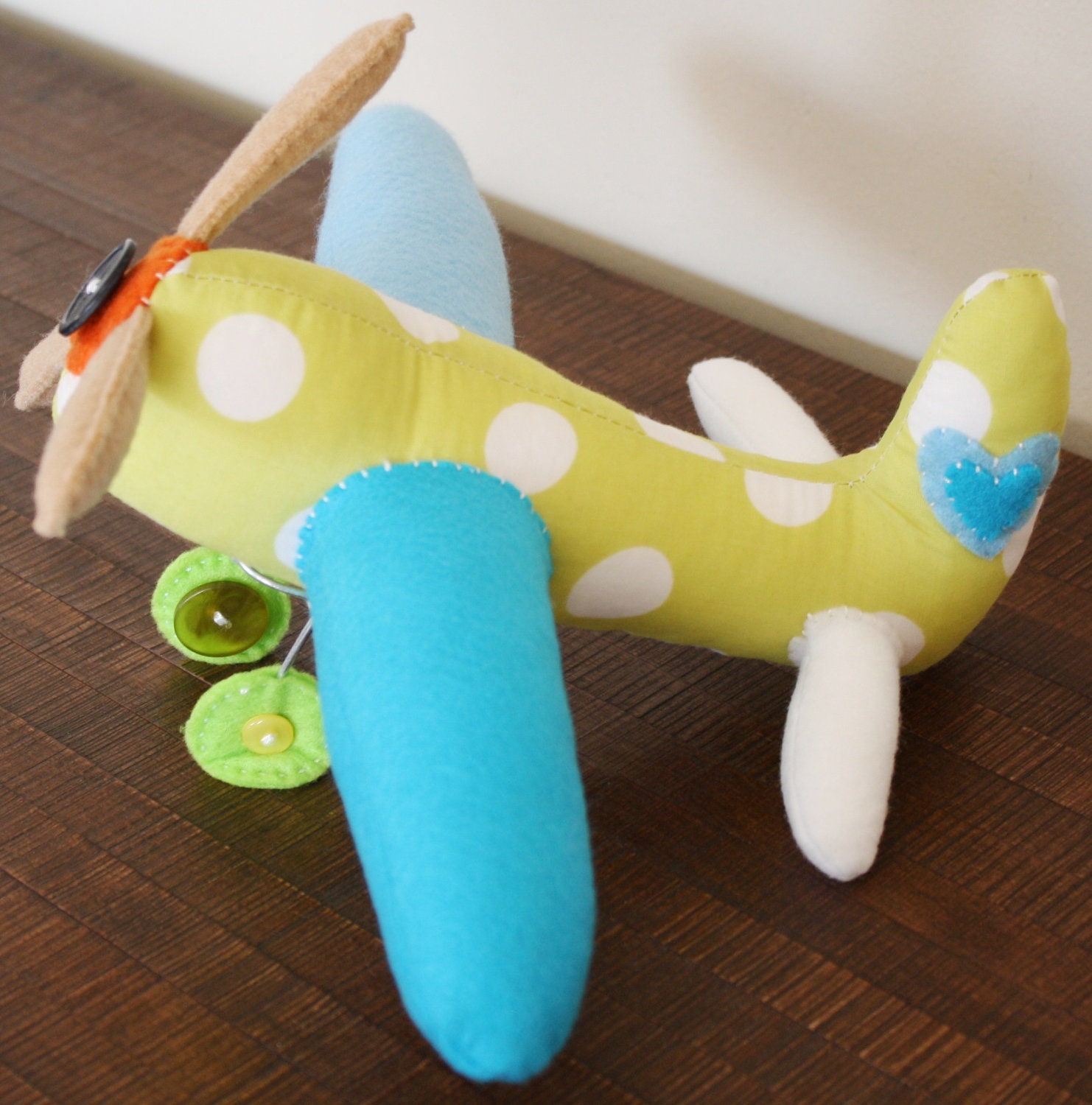 BOObeloobie Aeroplane in green and white polka dots with 2 shades of blue wing detail