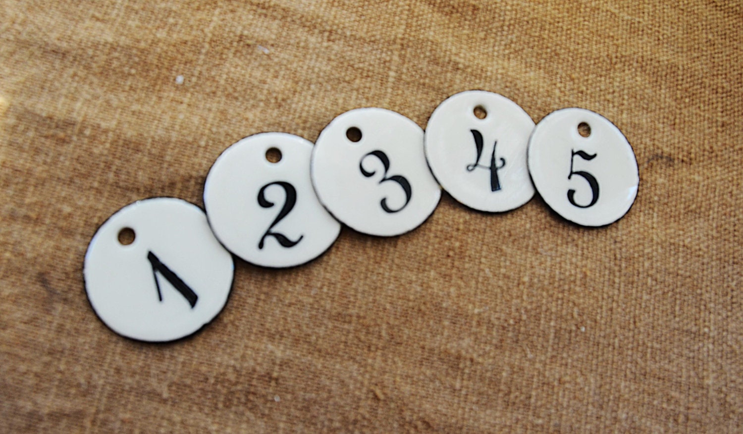 5 Round French Enameled Tags, luggage tags, and labels