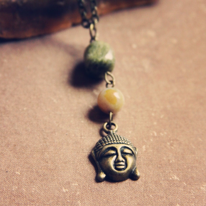 peace.  a simple earthy polished stone and buddha charm necklace.