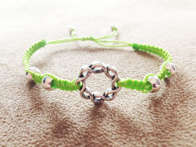 Macramé bracelet - lime green cord with antiqued silver-tone woven circle connector and four 6mm silver beads