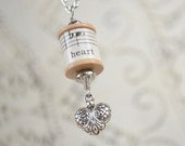 Thread Spool Necklace with Vintage Sheet Music