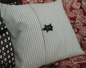 Neutral stripe pillow cover with turtle button