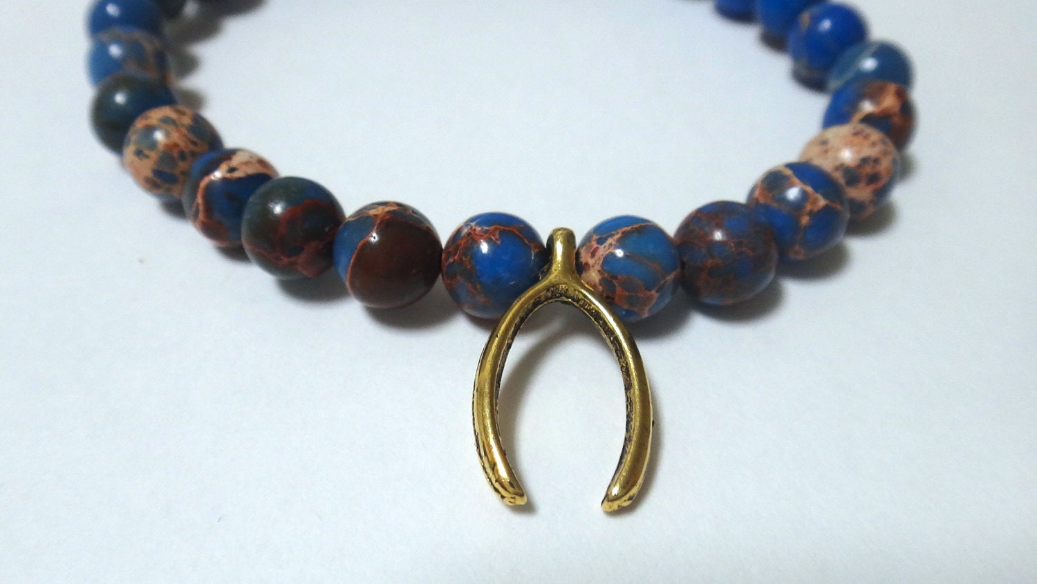 Light Blue Magnesite Beaded Bracelet with Gold Wishbone