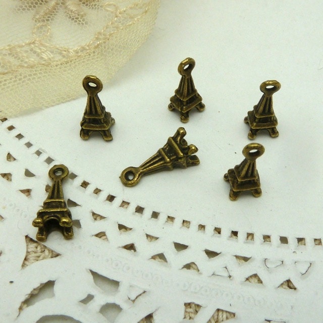 6 small antique bronze finish effel  tower charms 8 mm tall x 4 mm wide