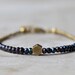 Brass hexagon bracelet: mystic black spinel beaded bracelet. Brass & beads collection.