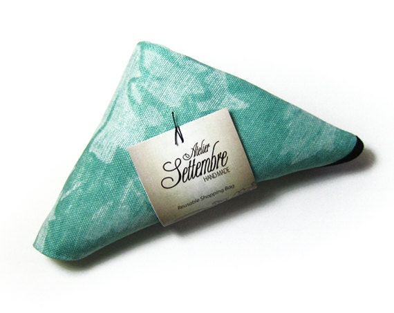 Reusable Shopping Bag, mint green cotton, edged in black ribbon, used for shopping or free time.