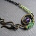 Amethyst and Silk-wrapped Spiral Bracelet with Oxidized Brass Chain and Peridot
