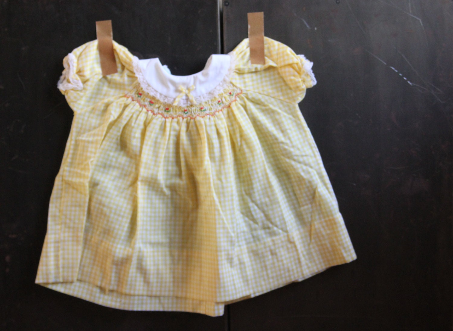 vintage yellow gingham smocked baby dress