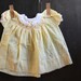 vintage yellow gingham smocked baby dress