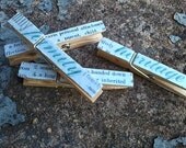 Set of 4 altered text clothespins