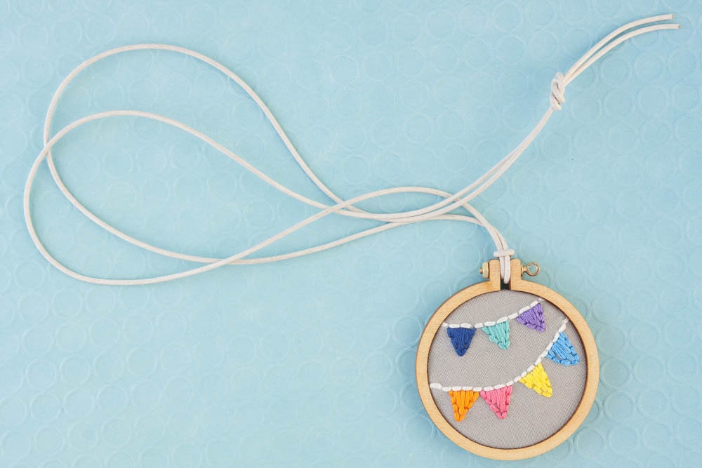 Bunting embroidery hoop necklace - navy, spearmint, purple, orange, pink, yellow, blue - miniature hoop - made with love by dandelyne