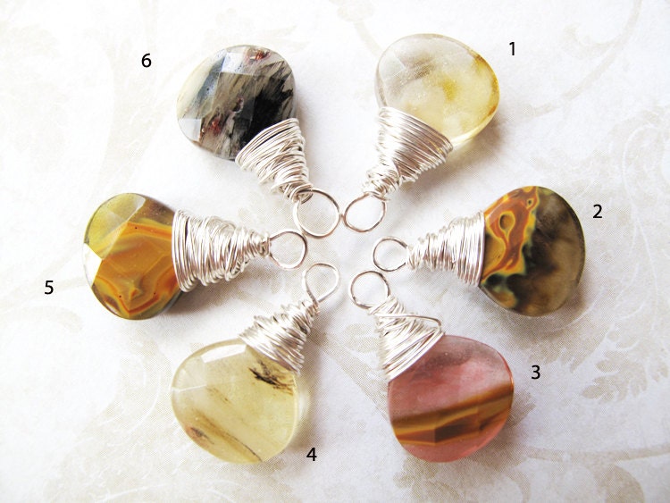 Rutilated quartz wire wrapped pendant. Fall fashion. Warm colors. Autumn spices. Made in Colorado.