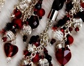 Handfasting cord in black, white and silver, with red with red and white flower detail