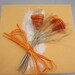 Colorful handwoven paper basket with lid crafted from upcycled paper