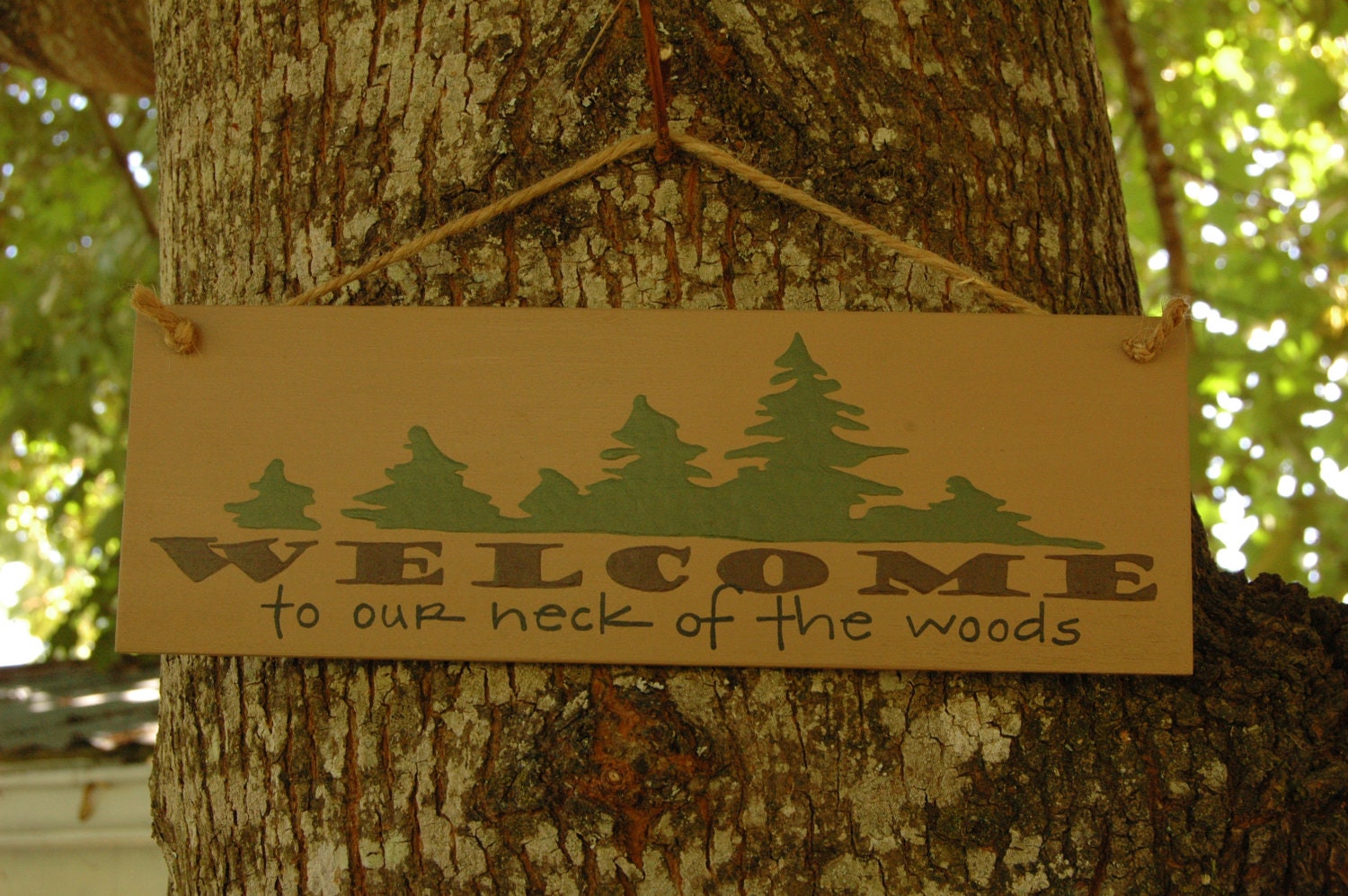 Welcome to our neck of the woods wood sign