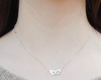 Silver mask necklace