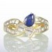 18 Karat Gold Pear Shape Ceylon Sapphire Diamond Bow Ring