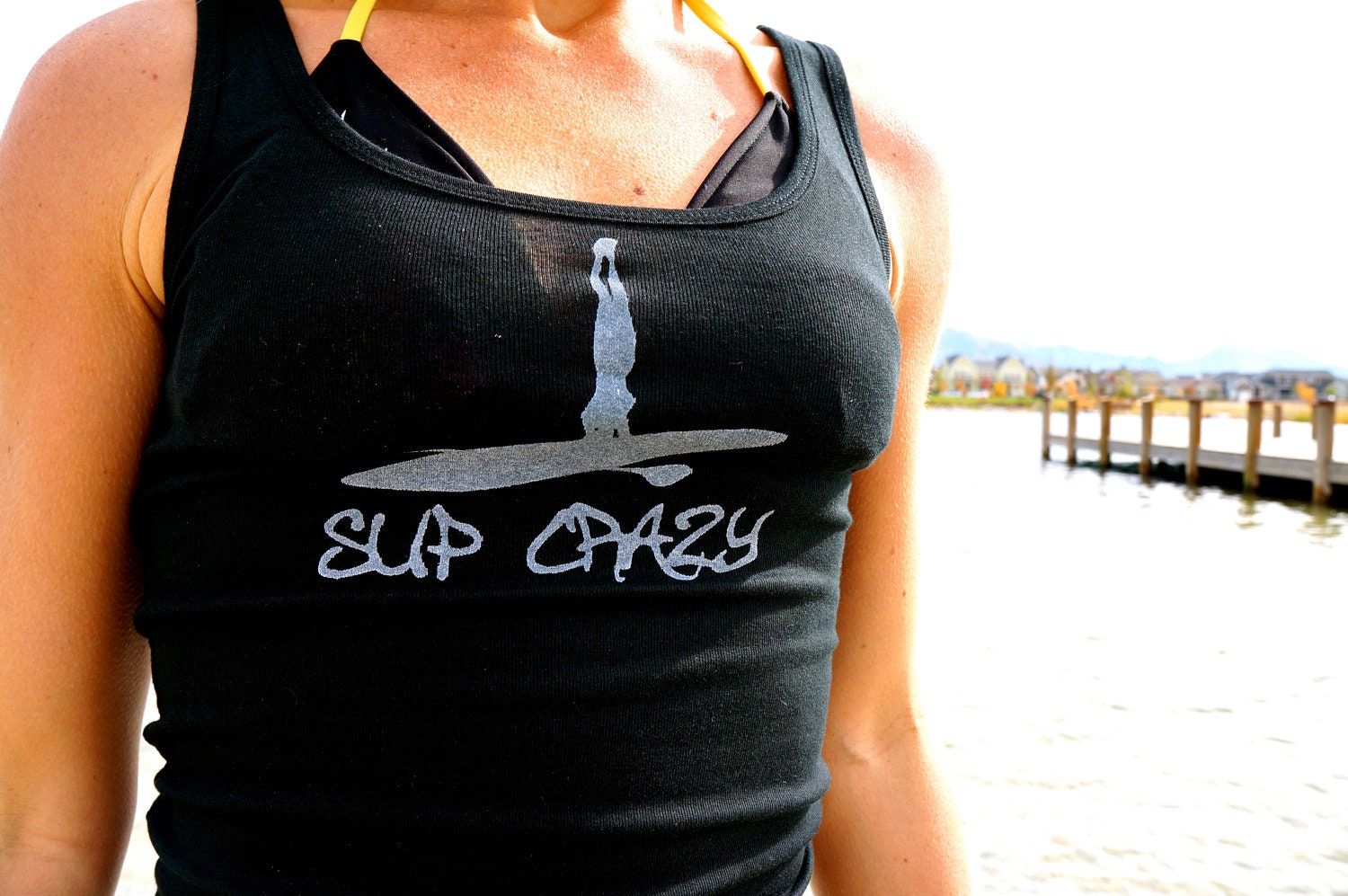 SUP Crazy done in vintage looking silk screen on a black workout tank top