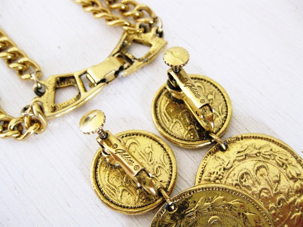 1960s necklace. goldette gold lion coin medallion set. EGYPTIAN GODDESS.