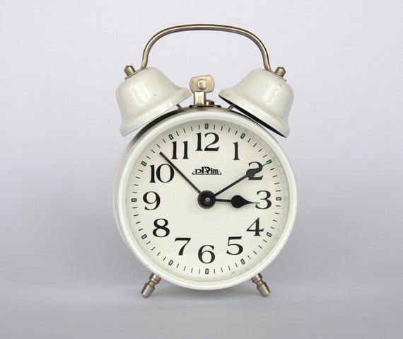Vintage Czech small mechanical alarm clock from Prim. Dual bell. White.