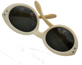 Vintage 1960s B&L Ray-Ban Bewitching sunglasses, cream-colored, nonprescription gray glass lenses