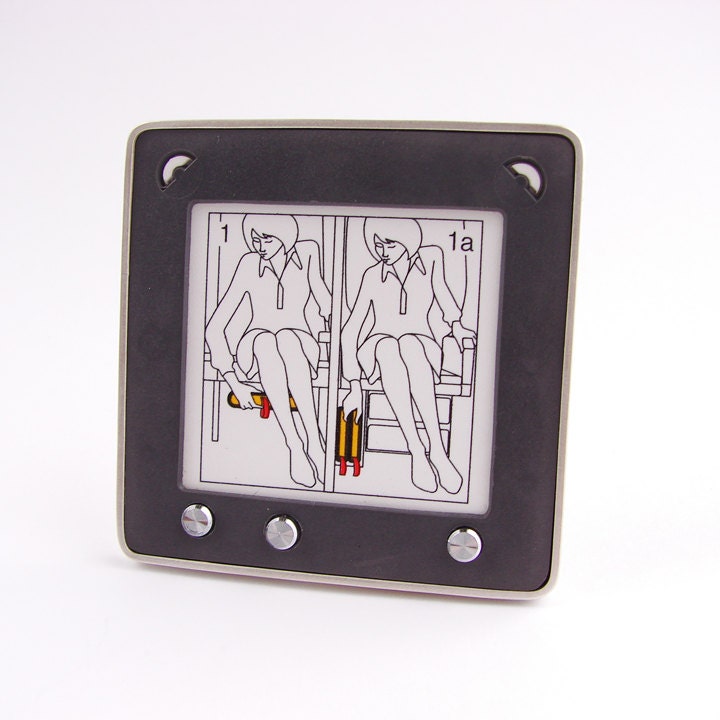 SHE's got a TICKET to RIDE  silver brooch 1