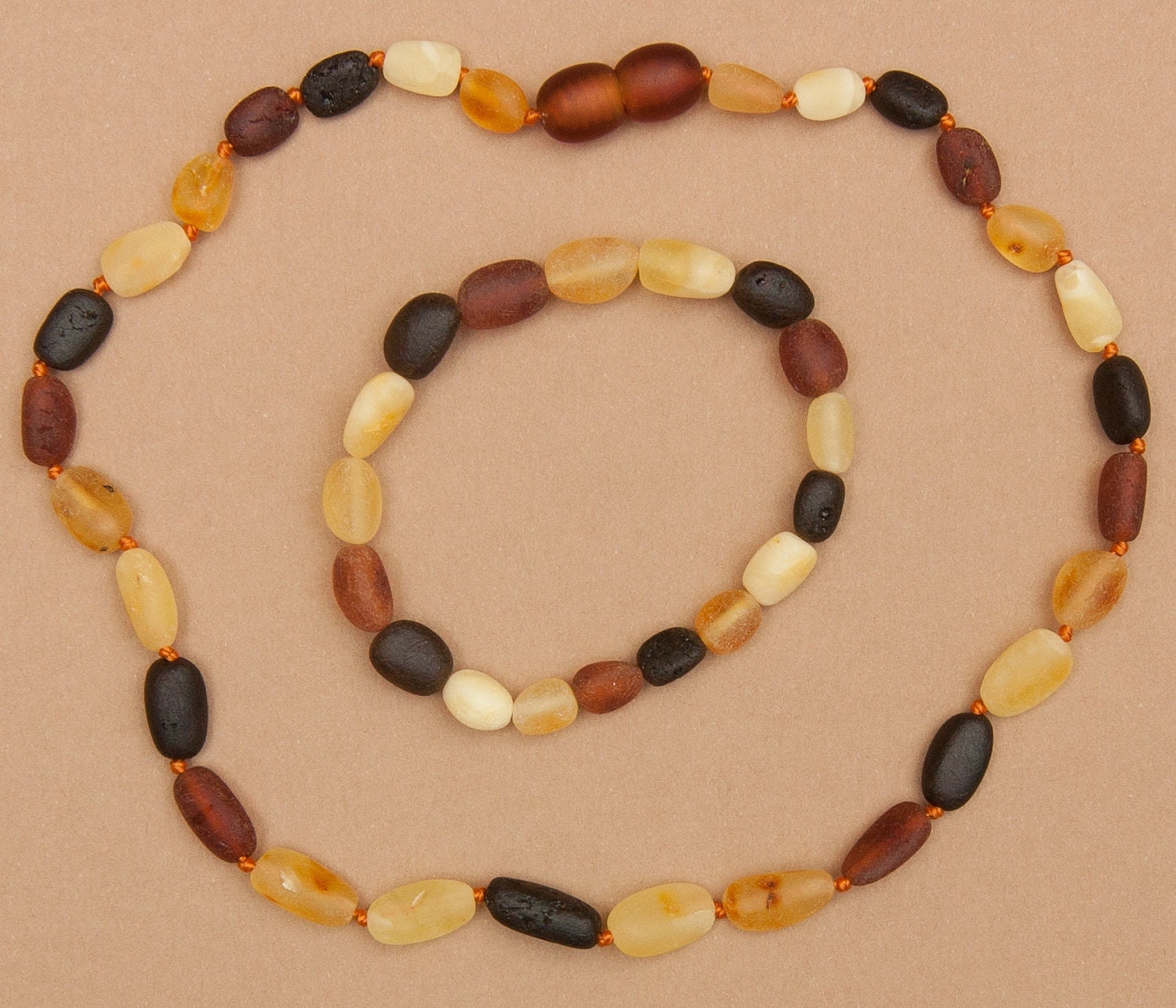 Raw multicolored Olive shape Amber teething necklace and bracelet