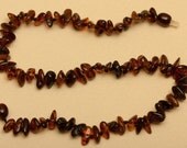 Polished Baltic Amber teething necklace for baby