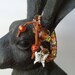 Chez glass and silk cord wrapped bracelet
