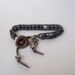 Leather bead wrapped boho bracelet in gray