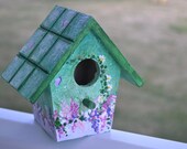 Floral hand painted birdhouse