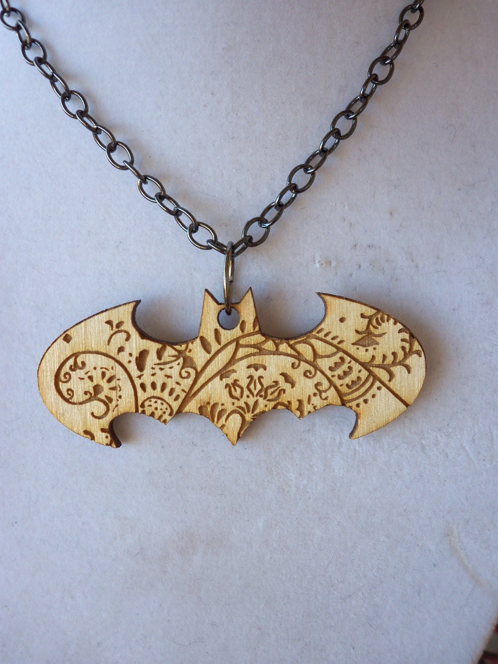Patterned Batman Bat necklace.