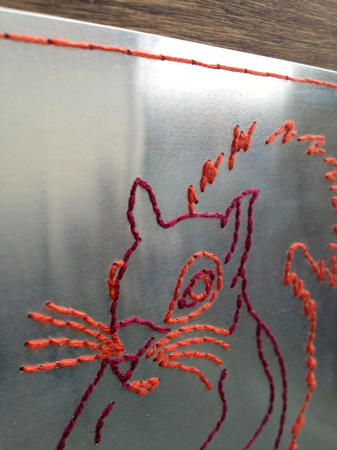 Rascally Squirrel Hand-Embroidered on Aluminum