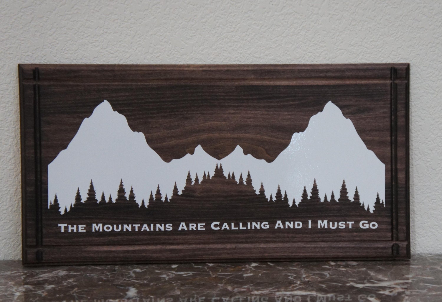 The Mountains Are Calling and I Must Go. Handcrafted Dark Stain Wood with vinyl and  Sign 22x11