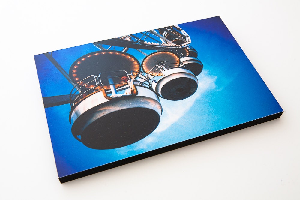 Big Wheel in Paris. 9" by 6"  Wooden block mounted Lomo Photograph. Shot on Film.