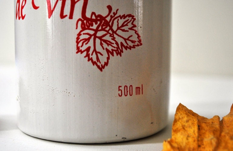 Vintage French Stoneware Covinor Red Wine Vinegar Bottle in white and Red colors with its a porcelain stopper