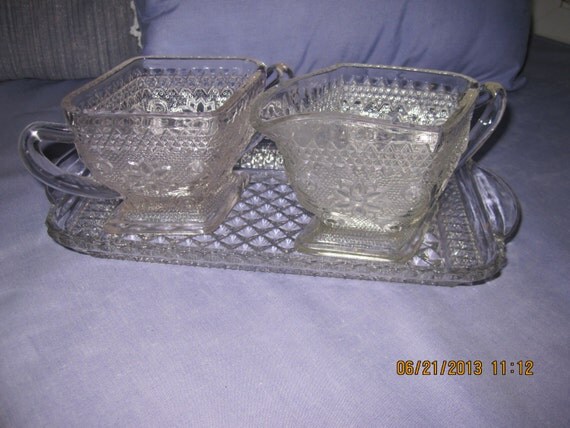 Clear Depression Glass sugar and creamer set with by