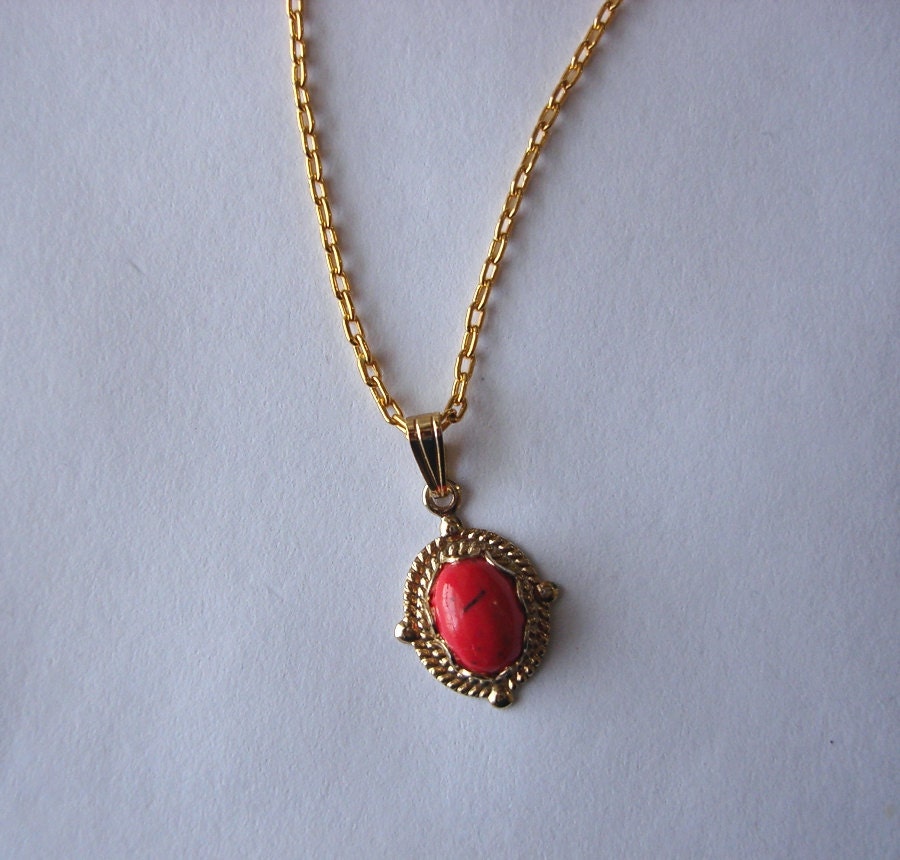 Goldplated chain bracelet with tea bead charm