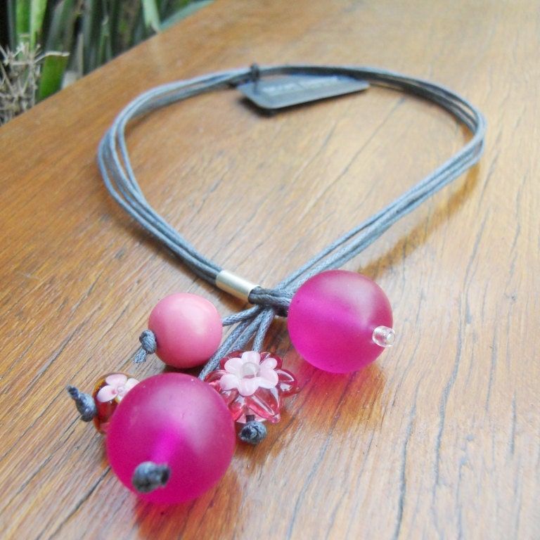 Rasberry pink resin and lampwork glass bead lariat on cotton cord