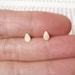 tiny raindrop teardrop ear studs in 9ct yellow gold, handmade in England