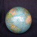 The World in your hand. Rescued globe.