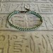 Beaded friendship bracelet in turquoise and bronze. Macrame jewelry.