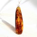 Sterling silver necklace with natural Baltic amber, cognac color with inclusions