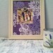 Magnetic photo board with purble and blue paisley print