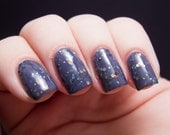 Between Two Worlds Nail Polish - lilac jelly with multicolor earth tone glitter