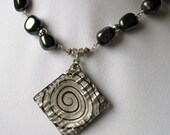 Hematite nuggets necklace,  diamond swirl pendant necklace