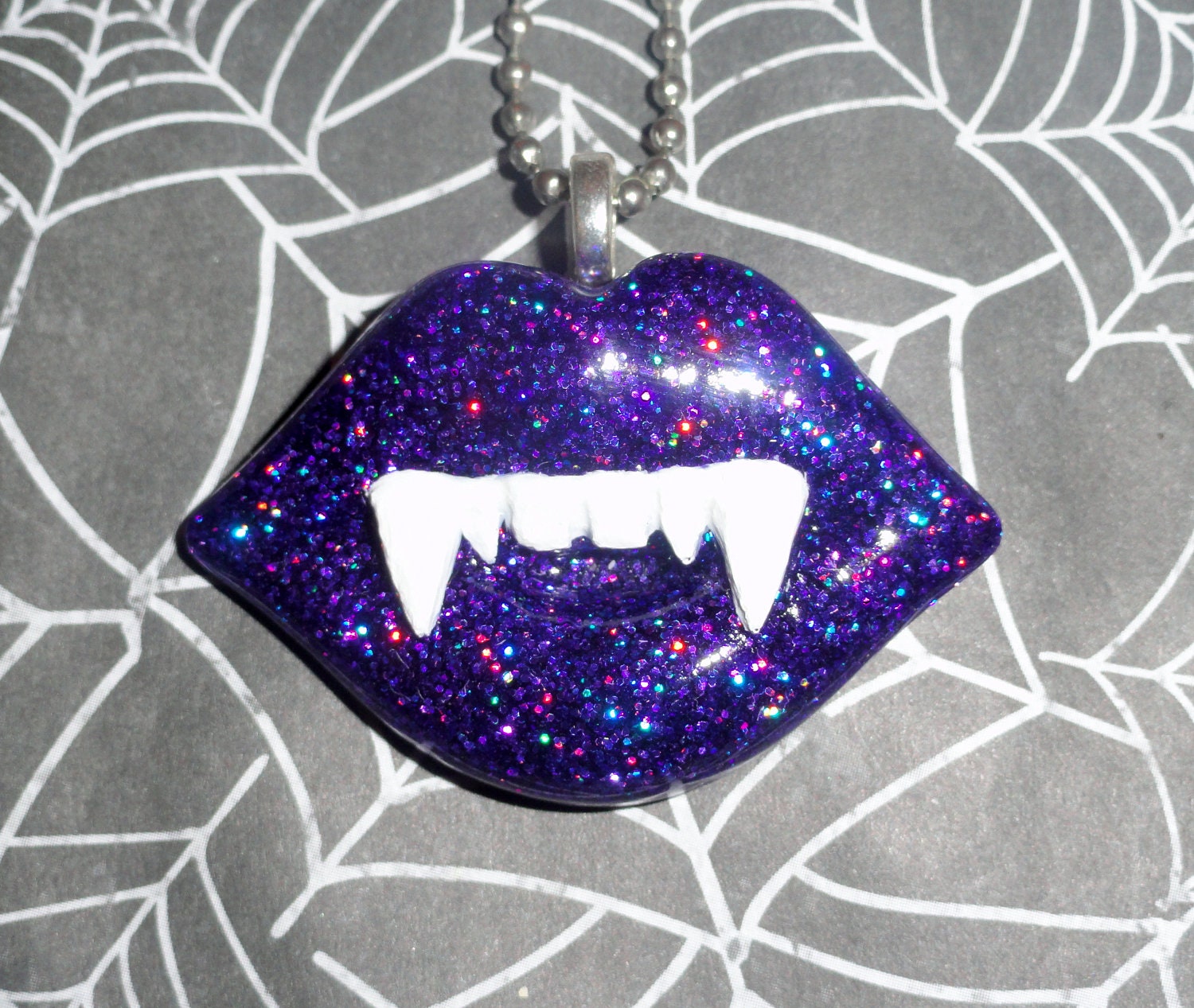 Vamp Kiss - Holographic Purple Glitter Resin Fang Lips Pendant Necklace