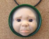 Pouty - Upcycled Doll Face Pendant